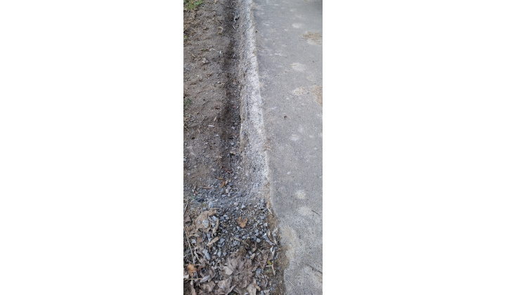 Úmyselné poškodenie cesty okolo rieky ORAVA pri futbalovom ihrisku